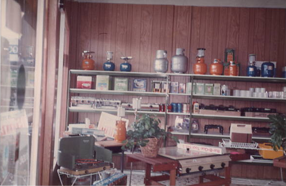 Old picture of shop shelves.